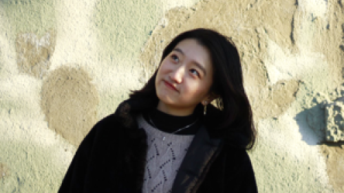 woman smiling looking up