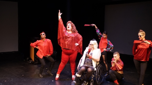 6 performers gesturing 