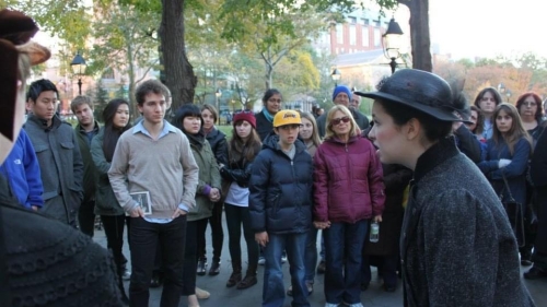 woman performing in outdoor play in front of audience