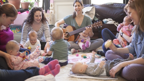 babies and parents in music class