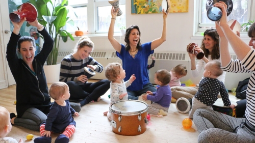 babies and parents in music class