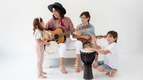 woman and childen with instruments 
