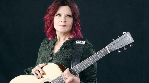 woman holding guitar