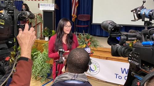 Kim King answers questions at a press conference