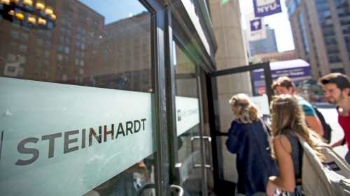 Students entering a NYU Steinhardt building