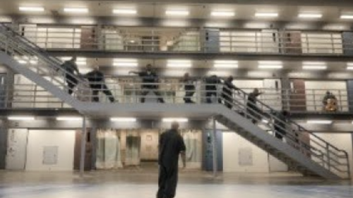 Man standing in prison