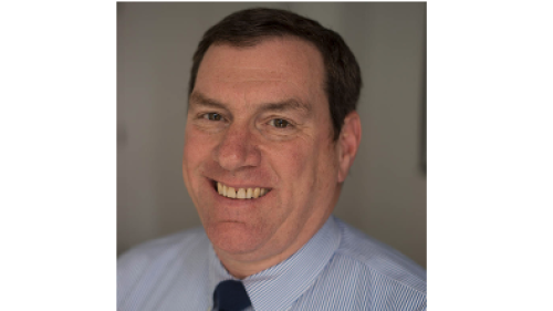 A headshot of James Kemple. 