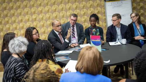DOE Chancellor David Banks, RANYCS Executive Director James Kemple, and Deputy Director Cheri Fancsali sit at a round table discussion at the 2022 NYC Equity Summit.