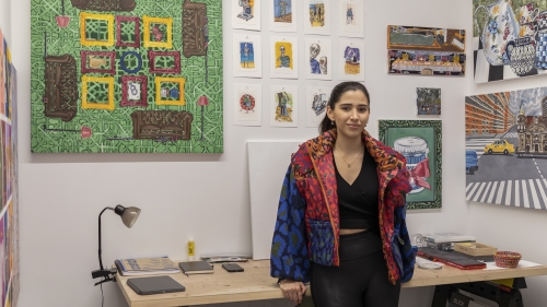 A student appears in her studio.