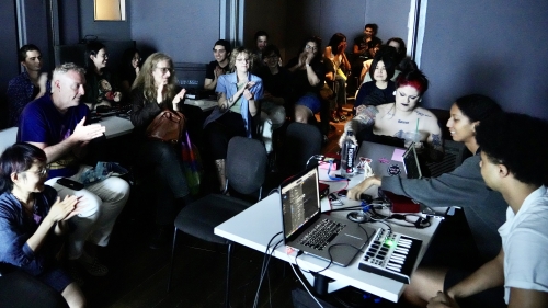 Class applauding music technology performance