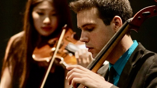 NYU Students on violin