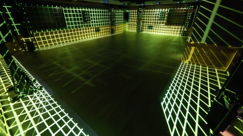 NYU Steinhardt audio lab lit up green, very modern