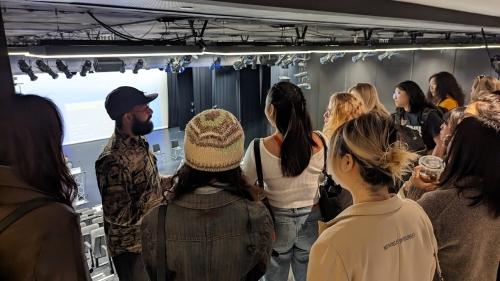 NYU students overlooking Alvin Ailey stage