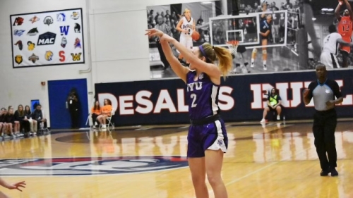 Honor Culpepper shoots a basketball during an NYU Violets game
