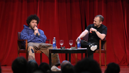 Benny Blanco on stage with NYU Music Business