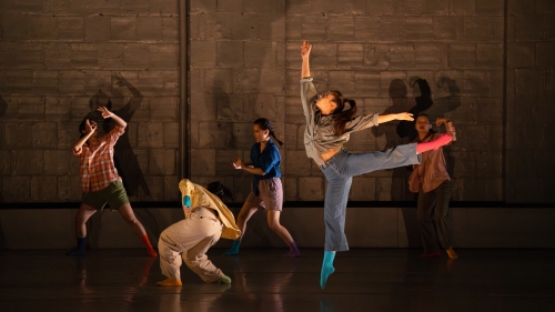 NYU dance ed performing on stage in casual clothes
