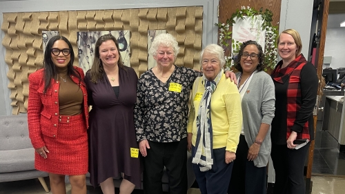Six educators posing for a photo together.