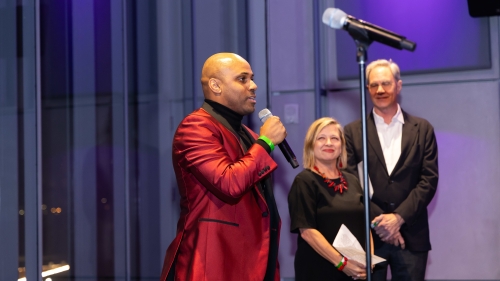 Leyland Simmons speaks into a microphone.