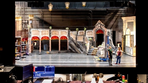 The Cantor Theatre stage is empty of performers as technicians focus the lights prior to a tech rehearsal.