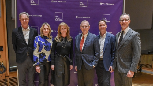 Six people pose for the photo