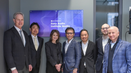 Group photo of the NYU, Sony, and Sony Audio Institute leadership in front of the new Sony Audio Institute studio