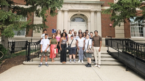 steinhardt students and staff at howard university in front of the founders building