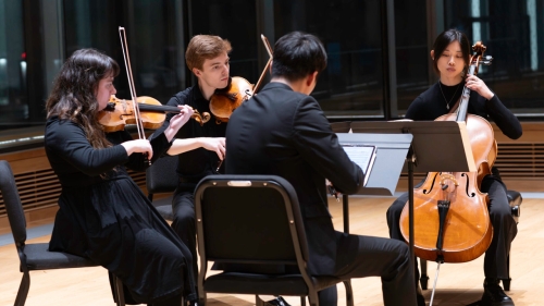 Orlando Bandini Viliani playing as part of a string quartet