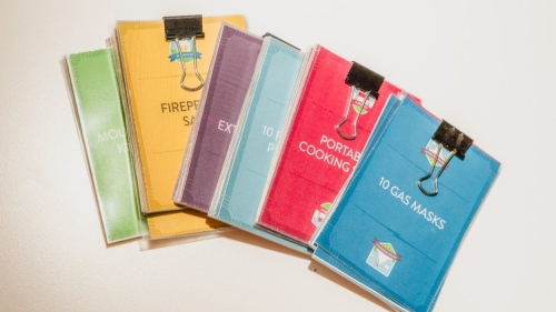 Cards in stacks for the disaster game.