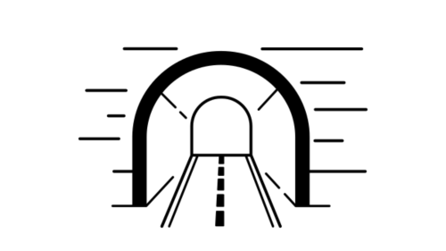 A tunnel with a road going under. 