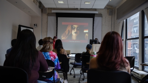Students watch a music video