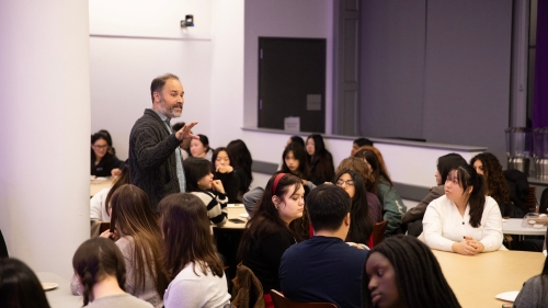 Ethan Youngerman speaks to a classroom of students
