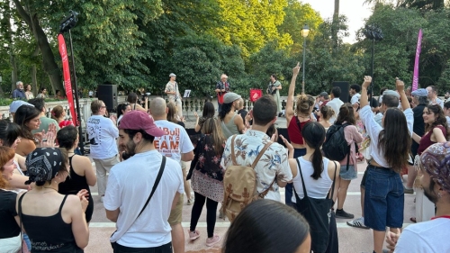Participating in a folklore dance session led by POM in El Retiro park, Spain
