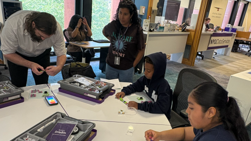 Students engage with STEM materials during the NYU Path day of learning. 
