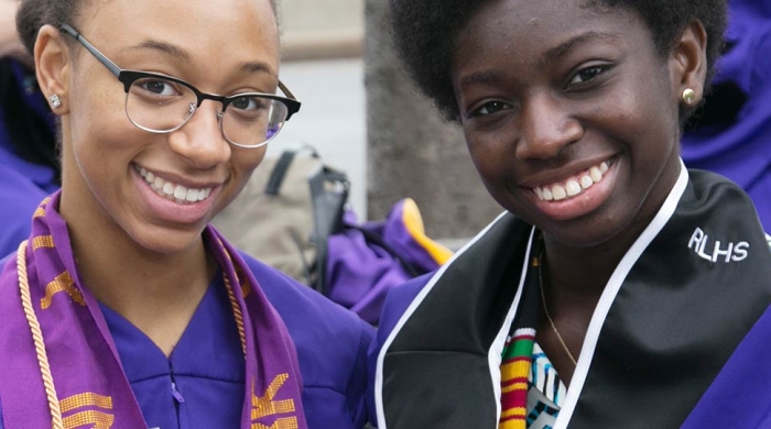 two students at graduation