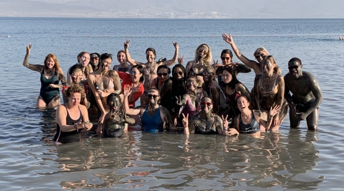 A group of students posing in the Dead Sea.