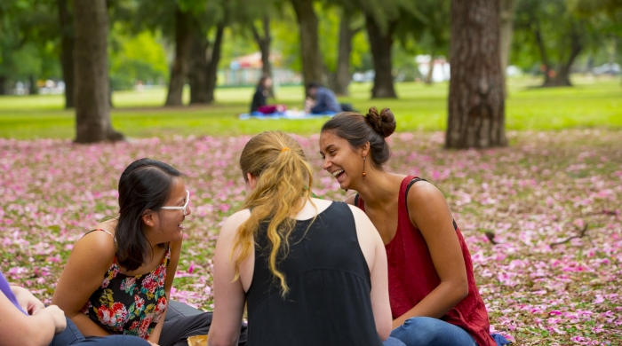Students laughing in the park