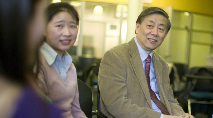 Professor Frank Tang and student