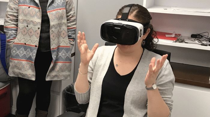 A woman in VR Goggles