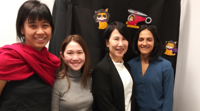Dr. Sudha Arunachalam with three visitors from the Singapore Ministry of Social and Family Development.