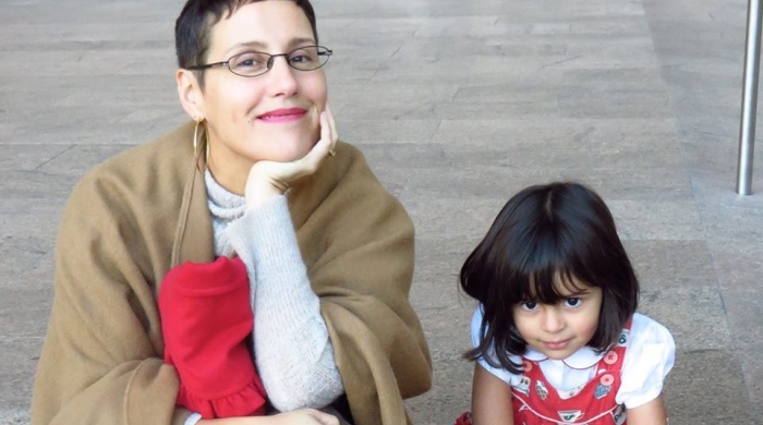 Dr. Gigliana Melzi and her daughter sitting together