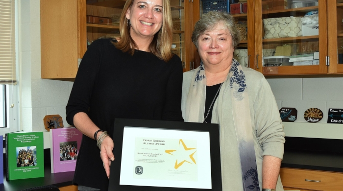 Dr. Kristie Patten Koenig receives the Doris Gordon Alumni Award last month at Homecoming