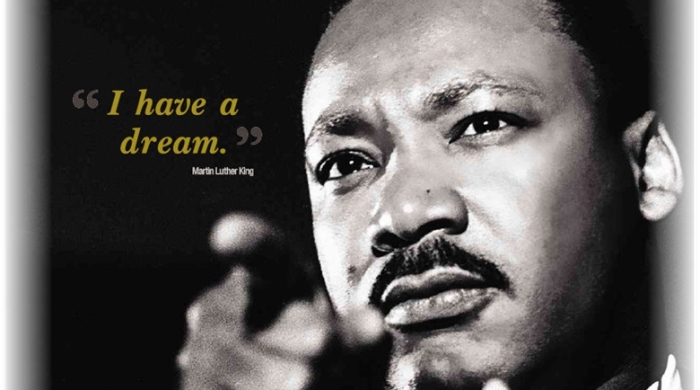 Face of Martin Luther King with the quote "I have a dream"