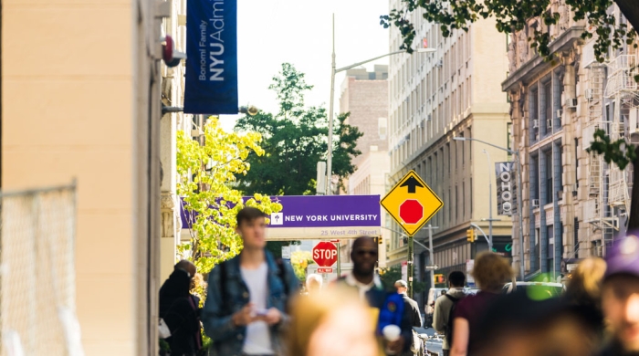 A busy street scene outside the NYU Welcome Center