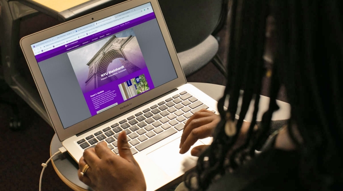 A student working on a laptop