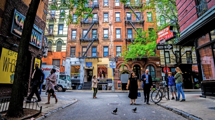 People walking along MacDougal Street in Greenwich Village