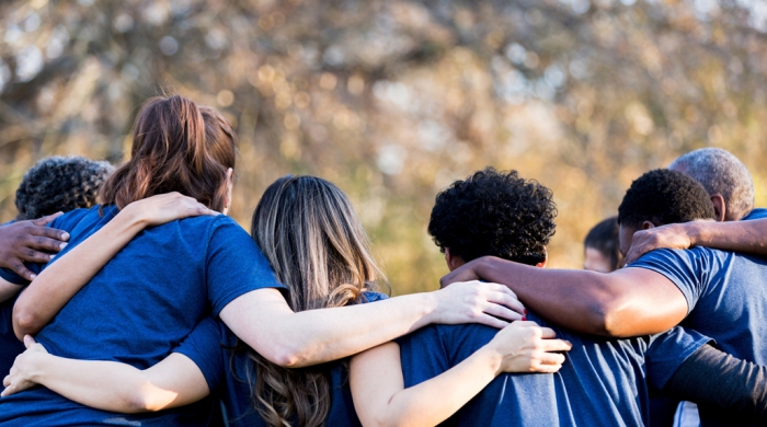 A group of students in a huddle