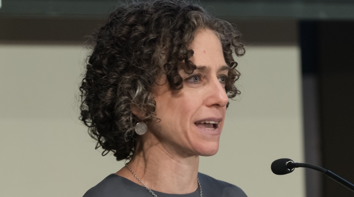Elise Cappella at podium