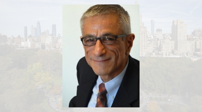 professional headshot of a man in a suit