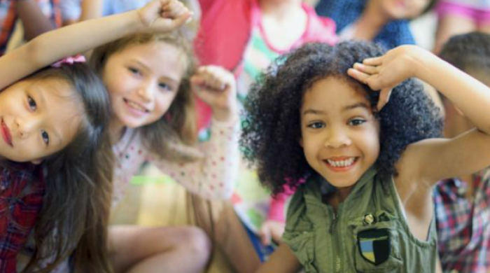 Photo of three young children