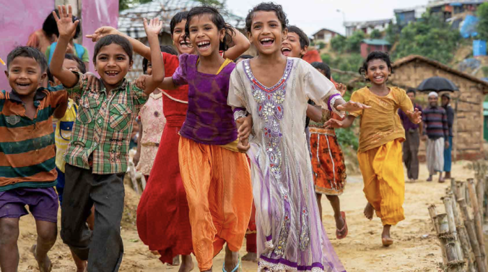 Kids in Bangladesh running and smiling